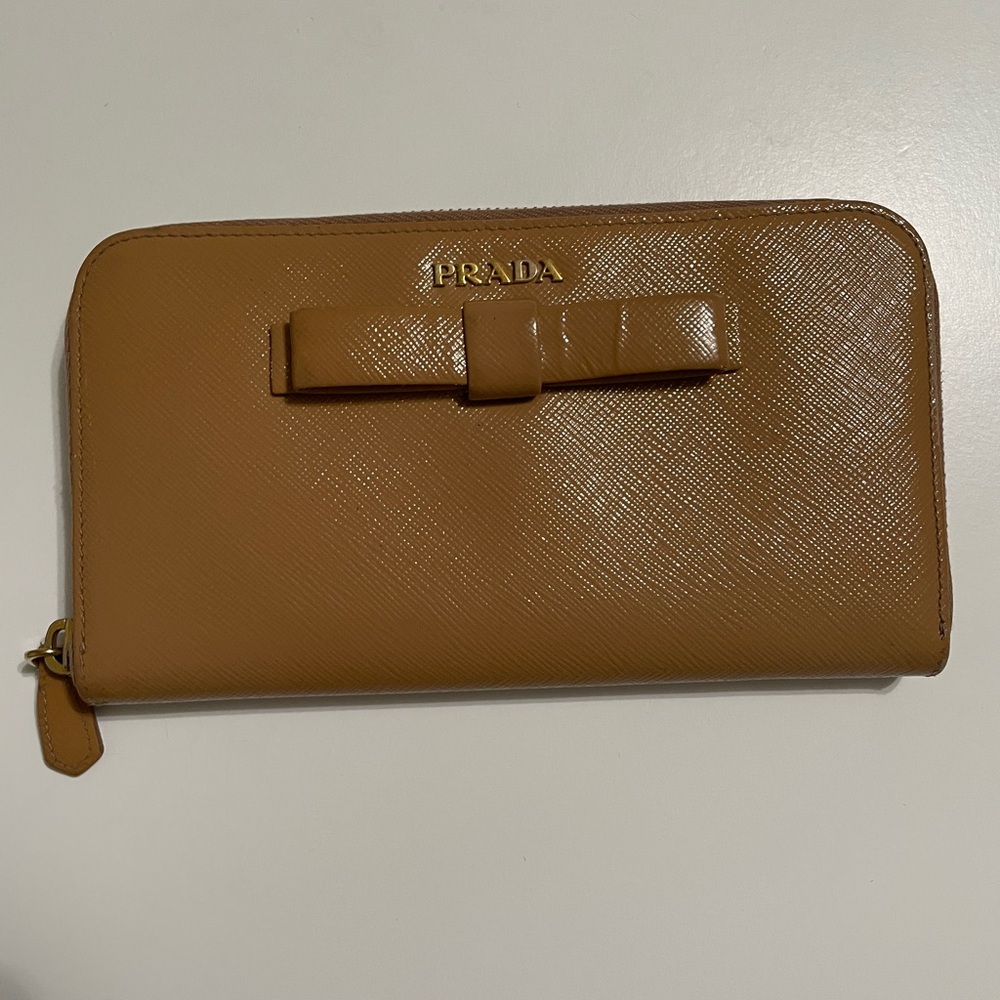 Prada Beige Saffiano Zippy Bow Wallet